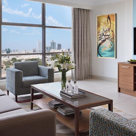Marriott Executive Apartments Al-Khubar Exteriér fotografie A living room in a typical apartment