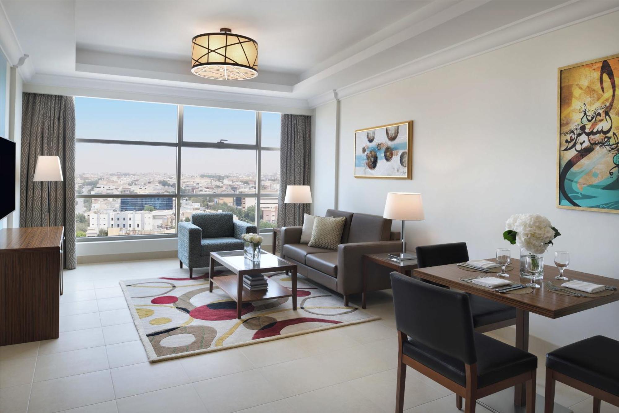 Marriott Executive Apartments Al-Khubar Exteriér fotografie A living room at the hotel